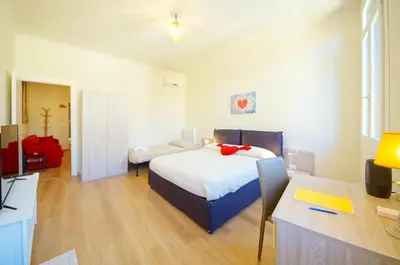 Letto o letti in una camera di Ca' Circus 4 Rooms WI-FI Fibre