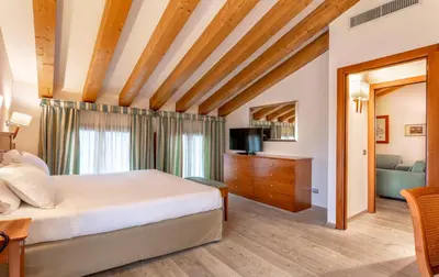 Letto o letti in una camera di BEST WESTERN Titian Inn Hotel Treviso