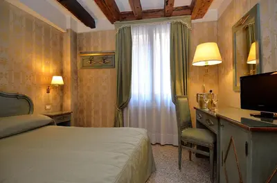 Letto o letti in una camera di Locanda La Corte