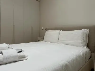 Letto o letti in una camera di Luxury Battisti free Parking