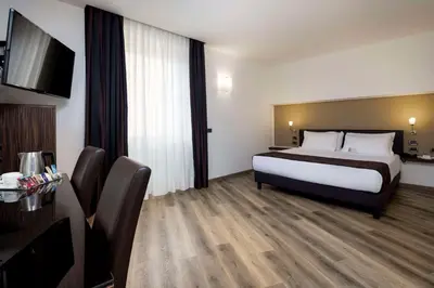 Letto o letti in una camera di Best Western Hotel Biri