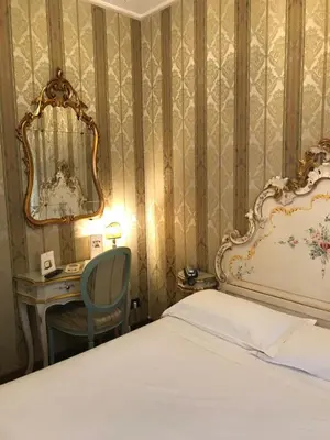 Letto o letti in una camera di Hotel Carlton On The Grand Canal