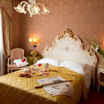Letto o letti in una camera di Hotel Carlton On The Grand Canal