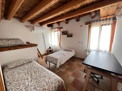 Letto o letti in una camera di Euganean Hills Apartment