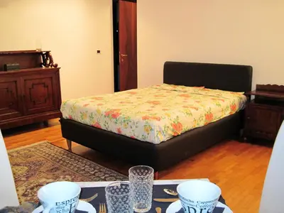 Letto o letti in una camera di B&B Al Duomo - PADOVA
