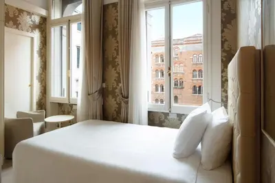 Letto o letti in una camera di Palazzo Barocci