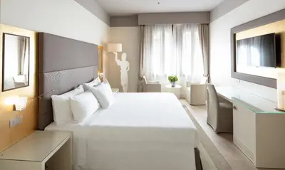 Letto o letti in una camera di Palazzo Barocci
