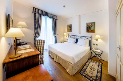 Letto o letti in una camera di Borgo Cà dei Sospiri