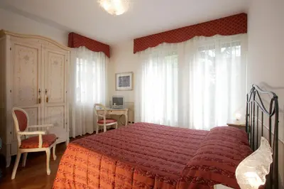 Letto o letti in una camera di Ca' San Rocco