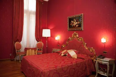 Letto o letti in una camera di Hotel Al Ponte Mocenigo
