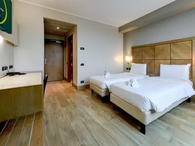 Letto o letti in una camera di B&B HOTEL Padova