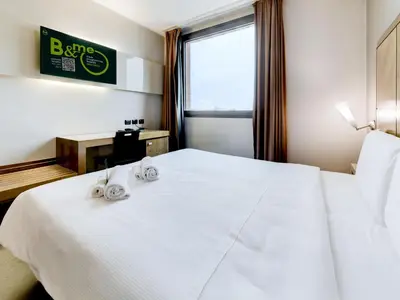Letto o letti in una camera di B&B HOTEL Padova