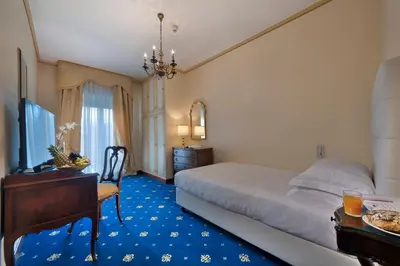Letto o letti in una camera di Hotel President Terme