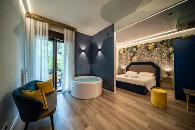 Letto o letti in una camera di Hotel Terme Milano