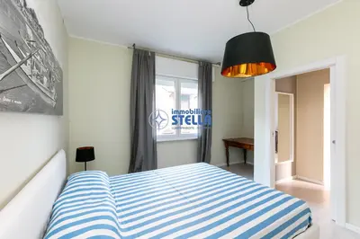 Letto o letti in una camera di Condominio Secchiati