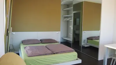Letto o letti in una camera di INGRAPPA CUBE