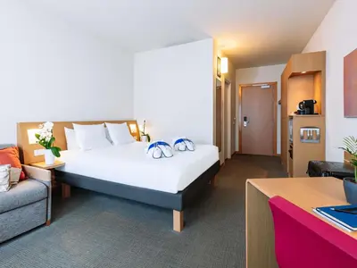 Letto o letti in una camera di Novotel Venezia Mestre Castellana
