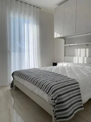 Letto o letti in una camera di Agua Apartment with beach included