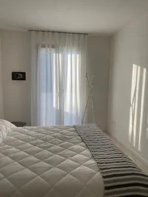 Letto o letti in una camera di Agua Apartment with beach included