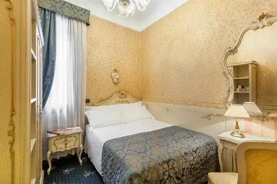 Letto o letti in una camera di Hotel Montecarlo