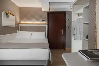 Letto o letti in una camera di Hotel Montecarlo