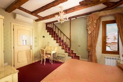 Letto o letti in una camera di Locanda Al Leon