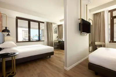 Letto o letti in una camera di Best Western Hotel Tritone
