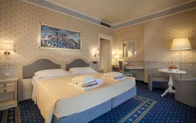 Letto o letti in una camera di Hotel Bristol Buja