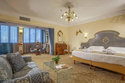 Letto o letti in una camera di Abano Ritz Hotel Terme