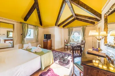 Letto o letti in una camera di Park Hotel Villa Fiorita