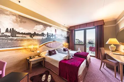 Letto o letti in una camera di Park Hotel Villa Fiorita