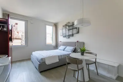 Letto o letti in una camera di Residenza SubitoSanto - Appartamento 5B 