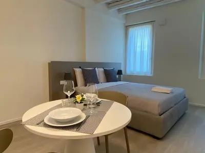 Letto o letti in una camera di Residenza SubitoSanto - Appartamento 6A 