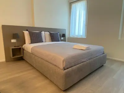 Letto o letti in una camera di Residenza SubitoSanto - Appartamento 6A 