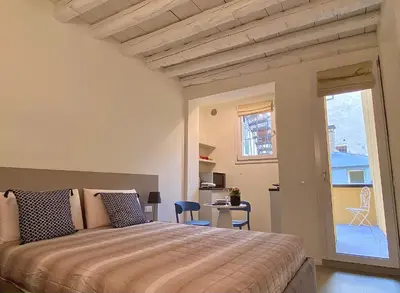 Letto o letti in una camera di Residenza SubitoSanto - Appartamento 1B 