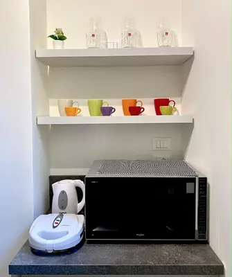 Set per la preparazione di tè e caffè presso Residenza SubitoSanto - Appartamento 1B 