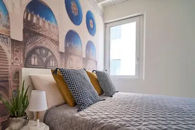 Letto o letti in una camera di Residenza SubitoSanto - Appartamento 5A 