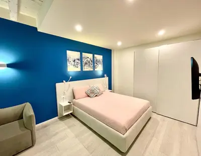 Letto o letti in una camera di Residenza SubitoSanto - Appartamento 1G 