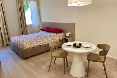 Letto o letti in una camera di Residenza SubitoSanto - Appartamento 4A 