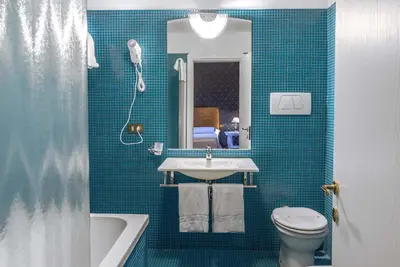 Bagno di Hotel La Fenice et Des Artistes