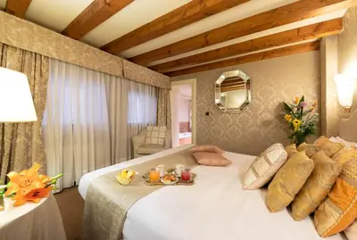 Letto o letti in una camera di Duodo Palace
