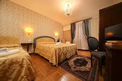 Letto o letti in una camera di Hotel Da Bruno