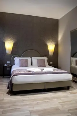 Letto o letti in una camera di Alle Guglie Boutique Hotel