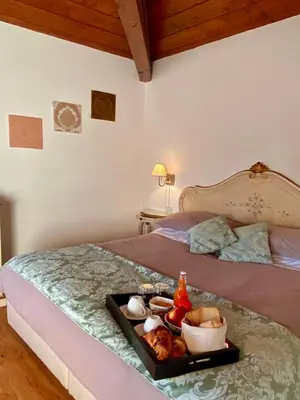 Letto o letti in una camera di Alloggi Ai Tessitori