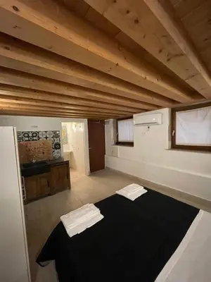 Letto o letti in una camera di Dimora Blu Suite