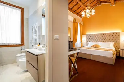 Letto o letti in una camera di Residenza La Duchessa Deluxe Rooms