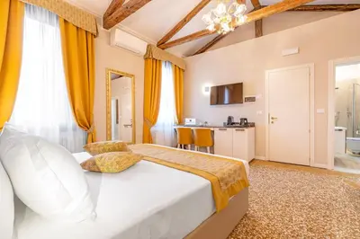 Letto o letti in una camera di Residenza La Duchessa Deluxe Rooms