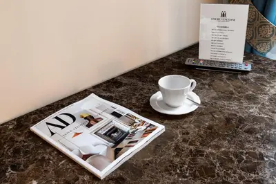 Set per la preparazione di tè e caffè presso Residenza La Duchessa Deluxe Rooms
