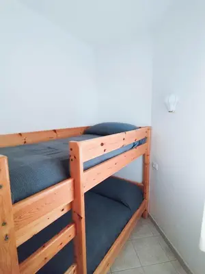 Letto o letti in una camera di Apollo Fronte Mare
