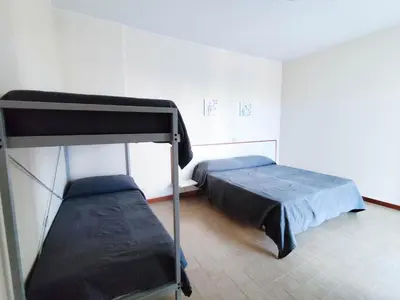 Letto o letti in una camera di RESIDENCE TORINO